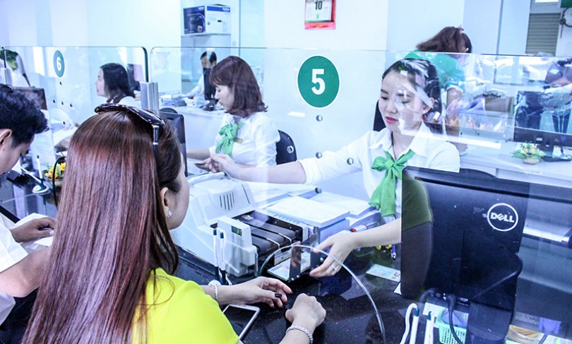 Hạn chế tình trạng đô-la hóa,

nâng cao vị thế của đồng tiền Việt Nam