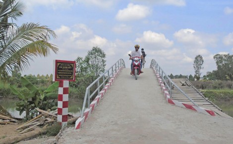 Chung sức xây dựng cầu, đường, đảm bảo giao thông an toàn
