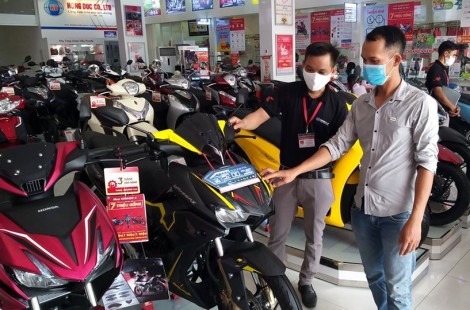 Thị trường xe gắn máy vẫn trầm lắng