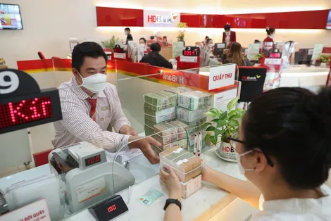 Nhu cầu tín dụng tăng mạnh, lãi suất huy động và cho vay “nóng” trở lại
